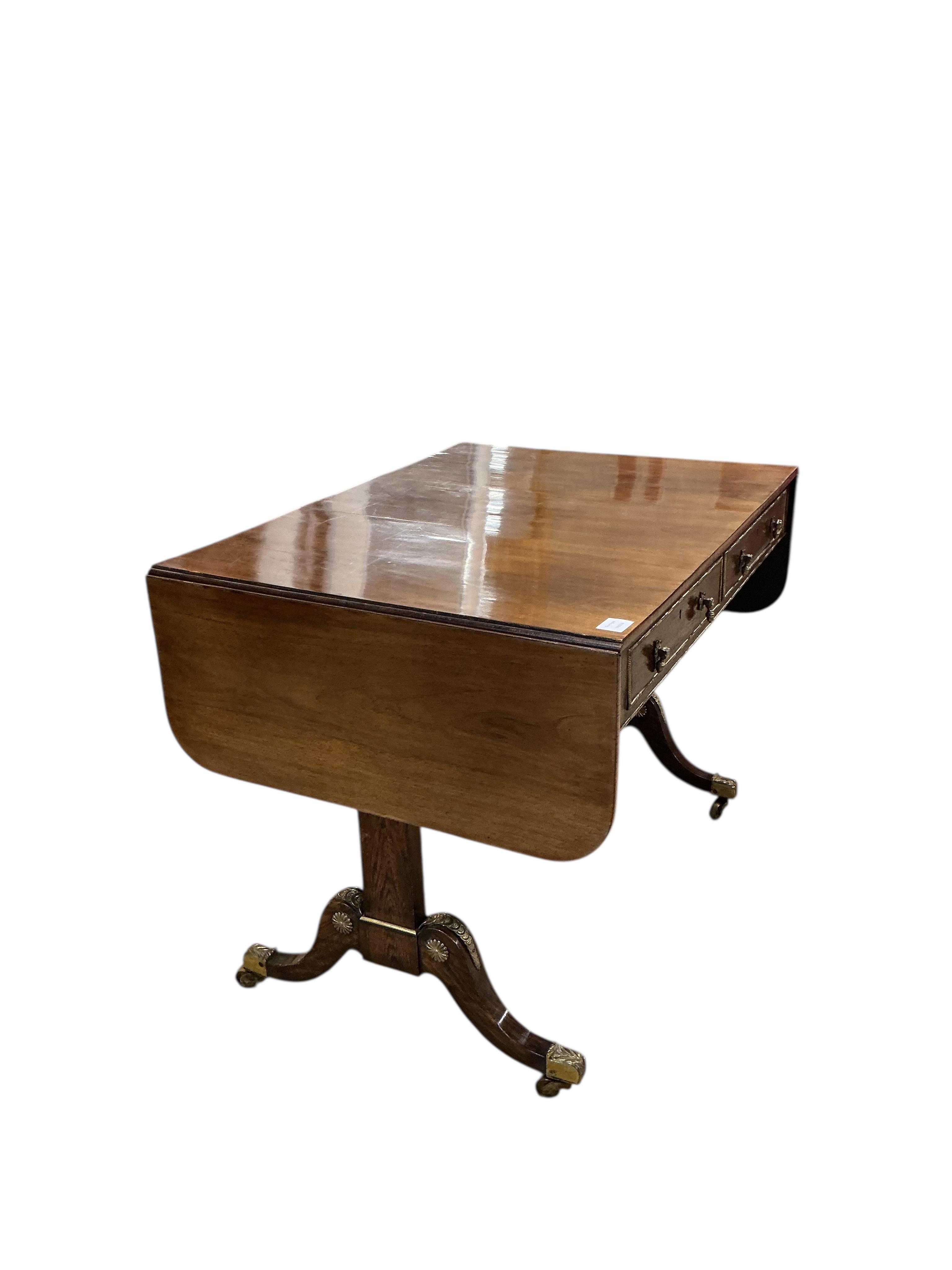 A Regency gilt metal mounted rosewood sofa table, width 94cm, depth 69cm, height 72cm